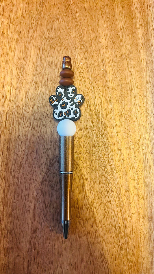 Pen with Leopard Paw Print Colors: Brown and White