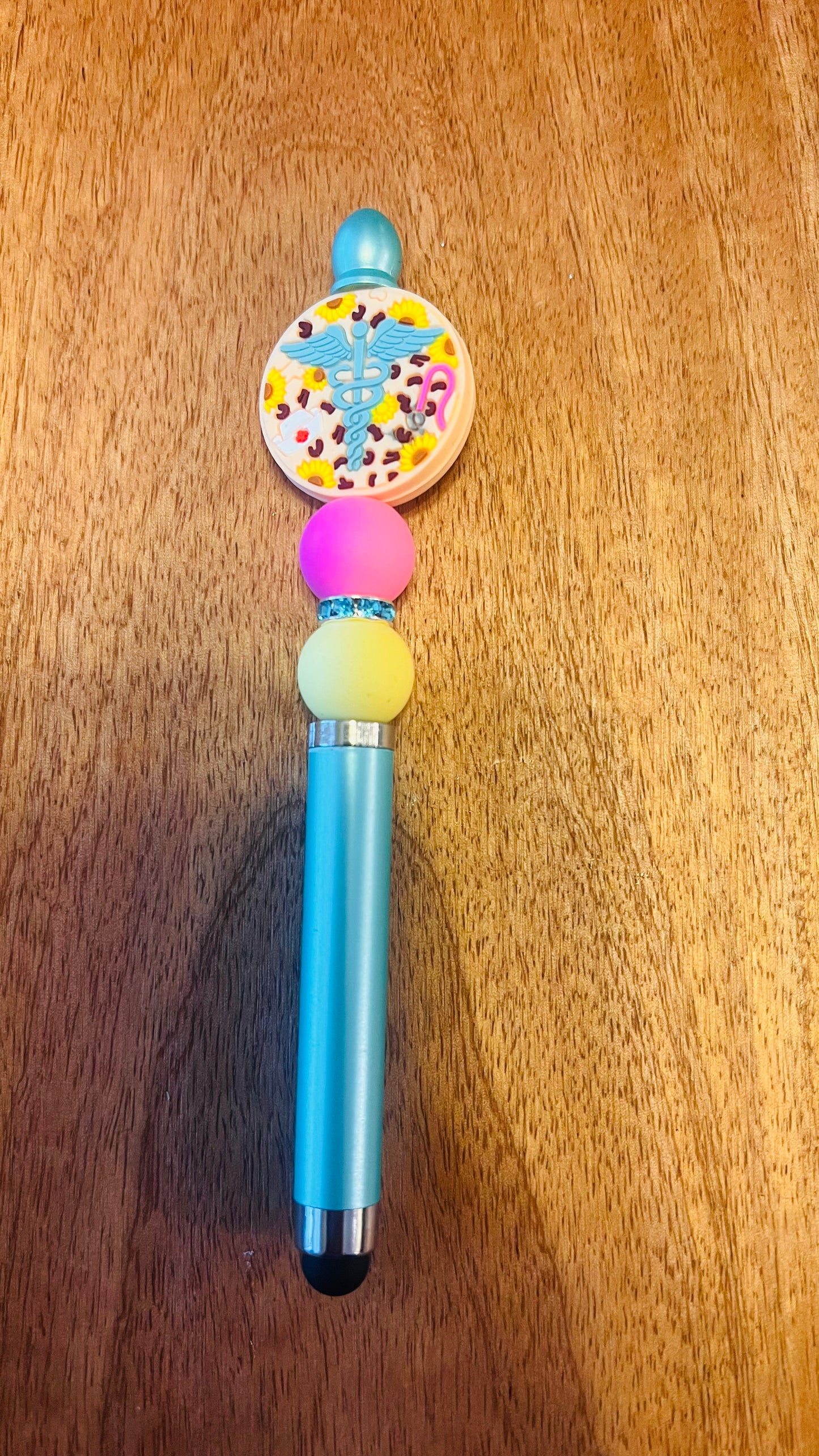 Stylus with Medical Focal Colors: Pink, Pale Yellow, and Blue Spacer