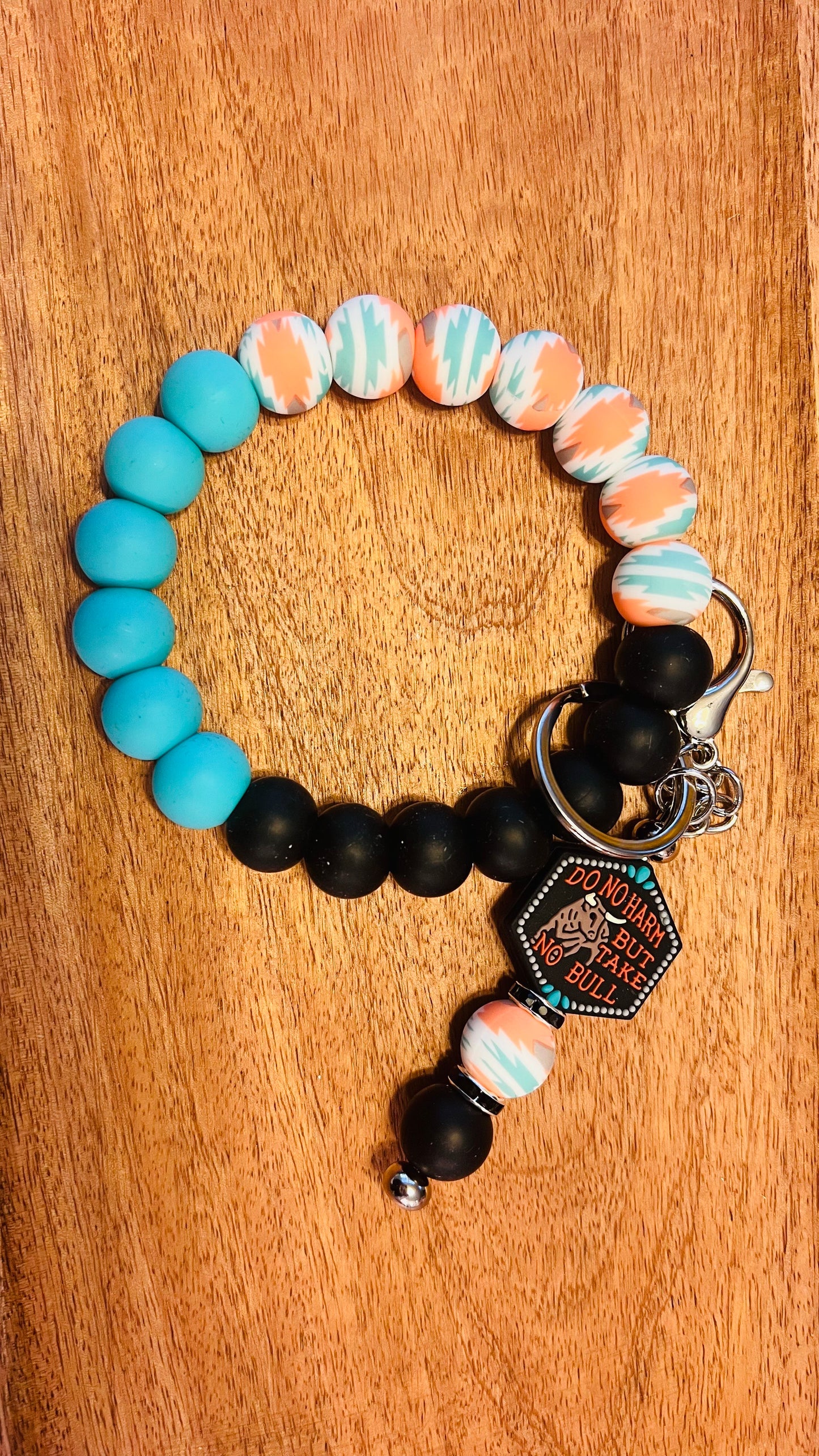 Wristlet AND DO NOT HARM FOCAL Bar Keychain Colors: Turquoise/ Orange Aztec, Black, and Blue