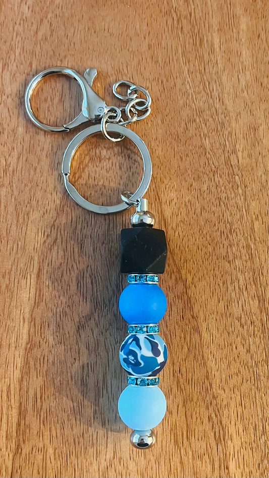 Bar Keychain Colors: Primary Blue, Baby Blue, Black, and Blue Camo